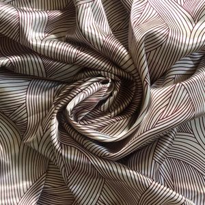 Beautiful ecru-burgundy wave charmeuse fabric sew